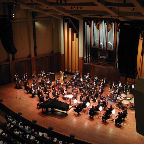 Seattle_Symphony_Orchestra_on_stage_in_Benaroya_Hall.jpg