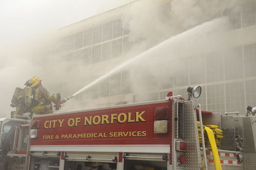 US_Navy_110127-N-3478R-345_Firefighters_extinguish_a_warehouse_fire_at_the_defense_distribution_depot_at_Naval_Station_Norfolk.jpg