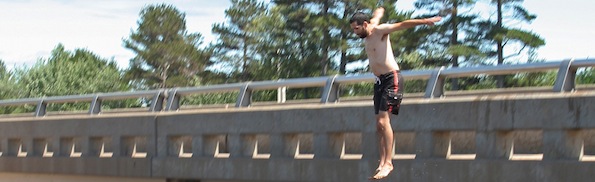 man jumping off bridge.jpg
